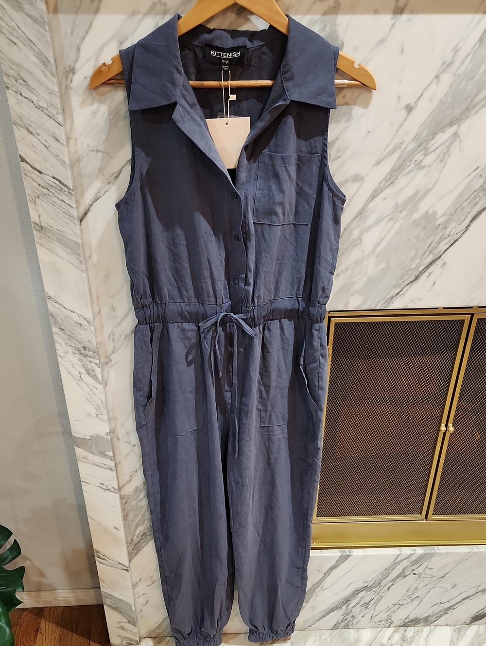 Kittenish Sleeveless Button-Front Navy Jumpsuit with Drawstring Waist